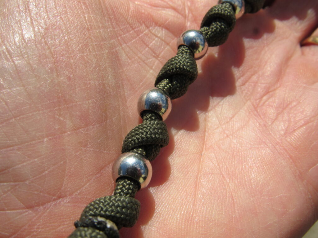 Stainless Steel on Paracord Prayer Beads close up