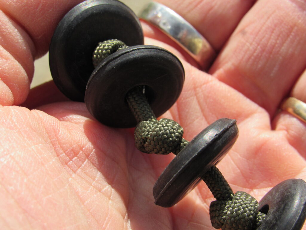 Prayer Bead Strand: Horn Beads on Paracord close up